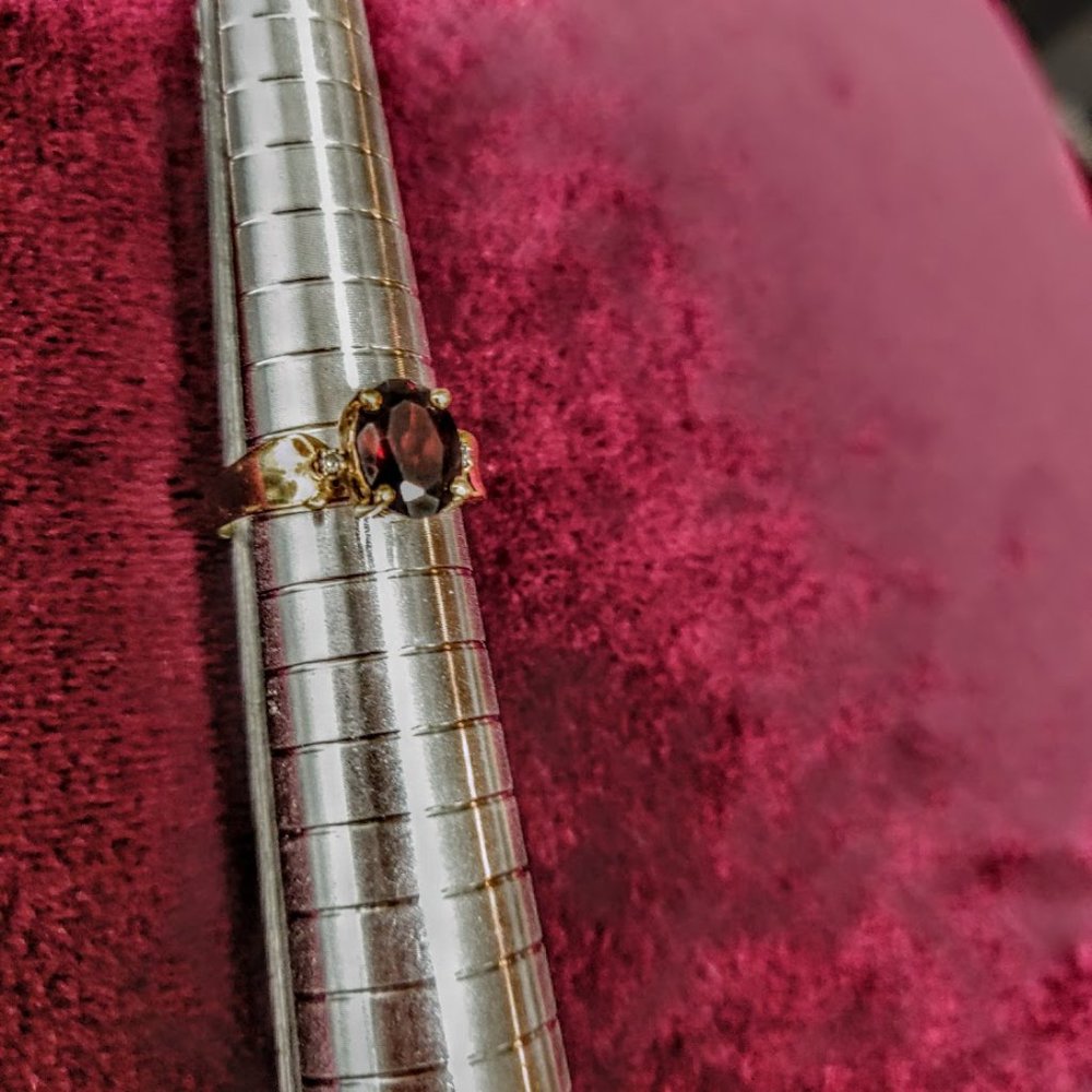 10K Yellow Gold and Garnet Solitaire Ring with Diamond Accents